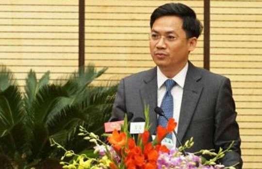 Ông Hà Minh Hải, Cục trưởng Cục Thuế Hà Nội trả lời chất vấn về nợ thuế. Ảnh: Minh Huệ