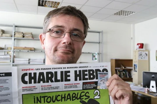 Tổng biên tập tờ Charlie Hebdo, ông Stephane Charbonnier - Ảnh: AP