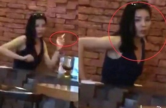 Hoa hậu Kỳ Duyên hút thuốc lá bị chộp được