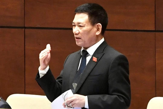 Bộ trưởng Bộ Tài chính Hồ Đức Phớc phát biểu tại Quốc hội chiều 25/7 (Ảnh: VGP)