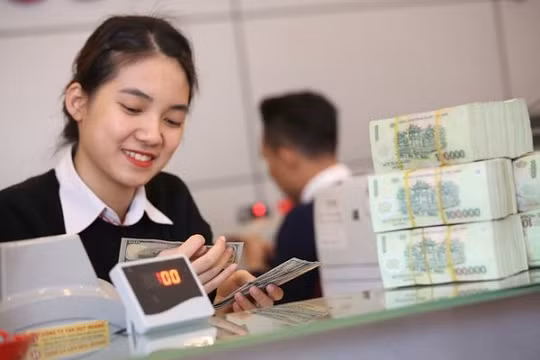 Trong điều kiện lý tưởng của dòng tiền nhưng lãi suất huy động lại hạ một cách nhỏ giọt. Ảnh: TTXVN