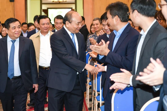 Thủ tướng đến làm việc với Bộ Kế hoạch và Đầu tư (KH&ĐT) sáng 19/2. (Ảnh: VGP)