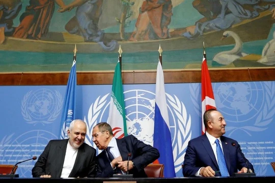 Ngoại trưởng các nước Iran, Nga và Thổ Nhĩ Kỳ trong cuộc gặp tại Geneva hôm 29/10 (Ảnh: Reuters)