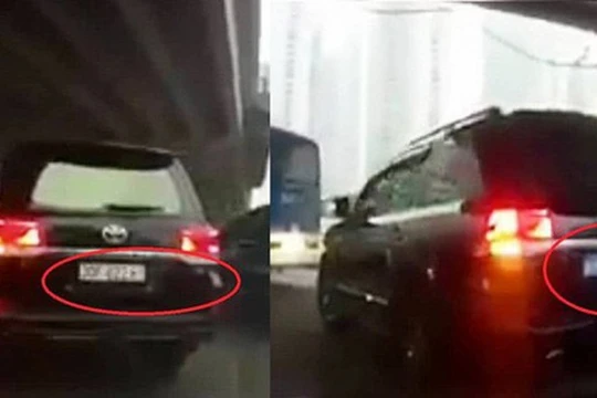 Chiếc Land Cruiser 7 chỗ đang chạy trên đường Phạm Văn Đồng bất ngờ đổi biển trắng sang biển xanh (ảnh: Cắt từ clip)