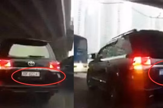 Chiếc Land Cruiser 7 chỗ đang chạy trên đường Phạm Văn Đồng bất ngờ đổi biển trắng sang biển xanh (ảnh: Cắt từ clip)