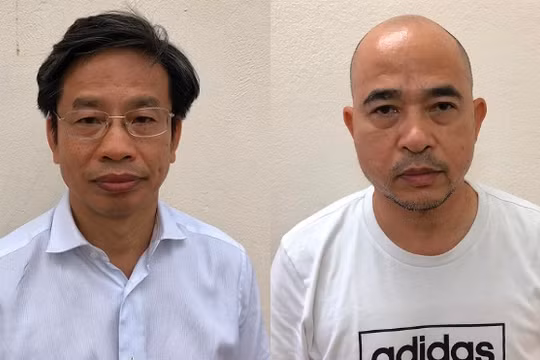 Ông Nguyễn Xuân Sơn (đeo kính) và Vũ Trọng Hải - Ảnh: bocongan.gov.vn