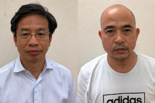 Ông Nguyễn Xuân Sơn (đeo kính) và Vũ Trọng Hải - Ảnh: bocongan.gov.vn