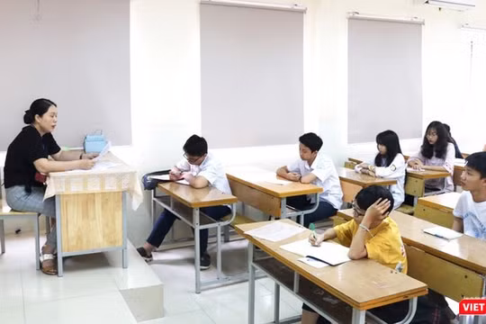 Giáo viên và học sinh trong giờ học (Ảnh: Minh Thúy) 