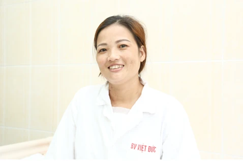 Chị Sáu khỏe mạnh và hạnh phúc sau 2 tuần trải qua ca phẫu thuật sinh tử. Ảnh: BVCC