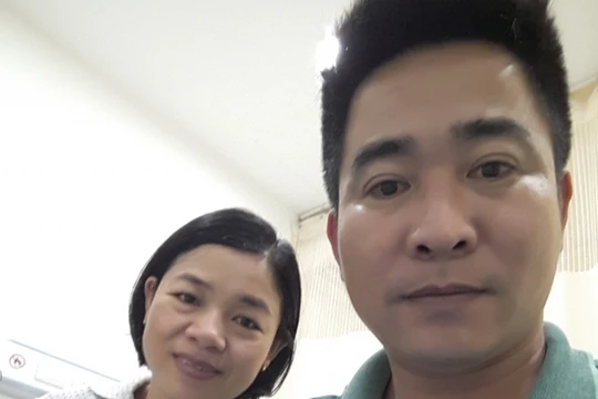 Vợ chồng anh Minh, chị Hướng hạnh phúc khi có con (Ảnh - BVCC) 