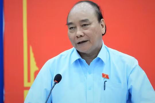 Chủ tịch nước Nguyễn Xuân Phúc tại Hội nghị tiếp xúc trực tuyến giữa tổ đại biểu Quốc hội TP.HCM với cử tri huyện Củ Chi và huyện Hóc Môn. Ảnh: Sỹ Đông