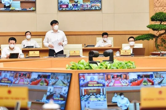 Bộ trưởng Bộ Y tế Nguyễn Thanh Long báo cáo tại hội nghị sáng 29/5- Ảnh: VGP/Nhật Bắc