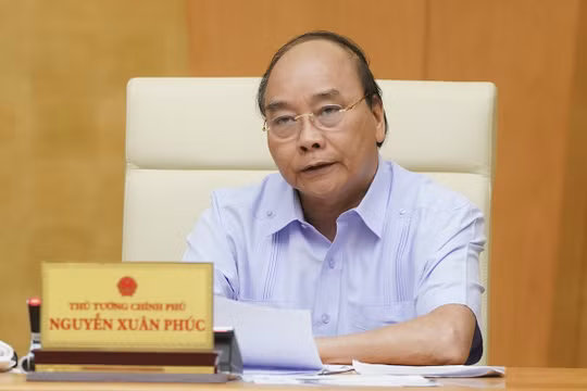 Thủ tướng Nguyễn Xuân Phúc phát biểu tại cuộc họp - Ảnh: VGP/Quang Hiếu