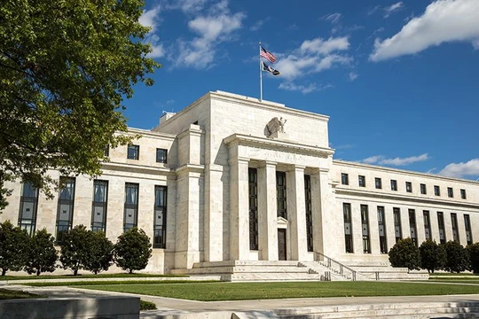 Thị trường vàng và cổ phiếu phản ứng mạnh ngay sau tuyên bố tăng lãi suất của Fed