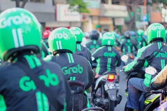 Grab vừa nhận thêm 1 tỷ USD từ các nhà đầu tư, chỉ hơn một tháng sau khi hãng nhận được 1 tỷ USD từ Toyota Motor Corp. (Ảnh: Bloomberg)
