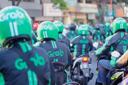 Grab vừa nhận thêm 1 tỷ USD từ các nhà đầu tư, chỉ hơn một tháng sau khi hãng nhận được 1 tỷ USD từ Toyota Motor Corp. (Ảnh: Bloomberg)