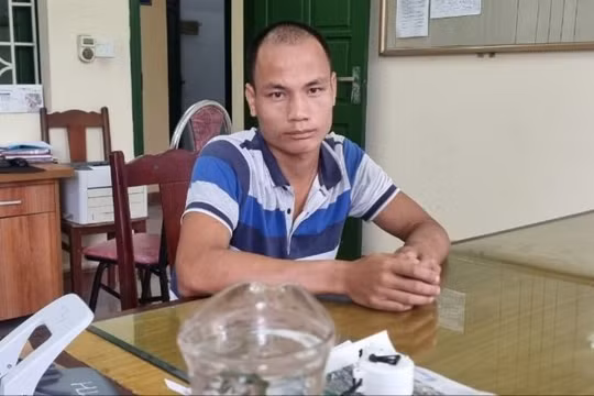 Phùng Văn Tú tại cơ quan công an.