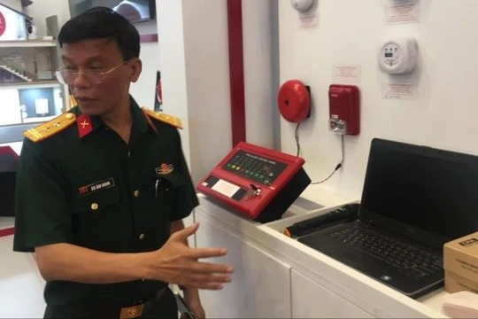 Trung tá Bùi Ánh Quang giới thiệu hệ thống cảnh báo sớm về hoả hoạn của Viettel tại Triển lãm Secutech Vietnam vừa được tổ chức ở Hà Nội. 