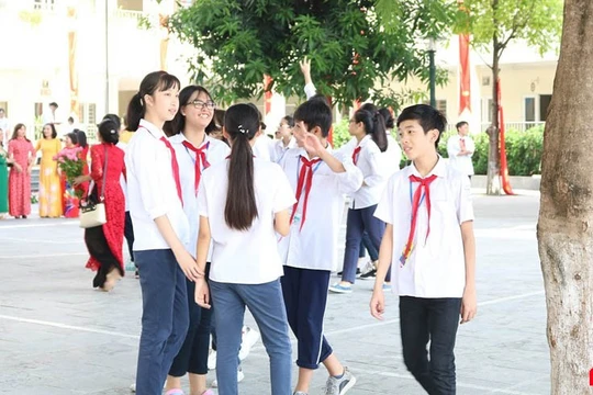 Học sinh tromg ngày khai giảng đầu năm học mới. Ảnh: Minh Thúy. 