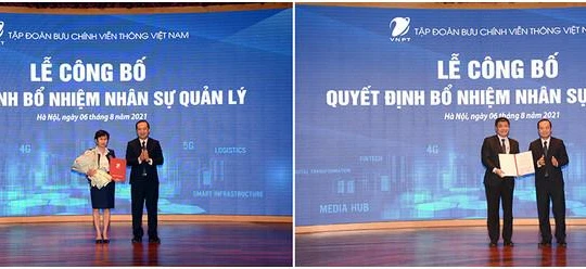 Chủ tịch VNPT Phạm Đức Long trao quyết định cho 2 phó Tổng GĐ Tập đoàn. Ảnh VNPT