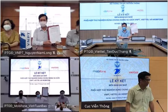 Các nhà mạng tại buổi ký kết. Ảnh Cục Viễn thông