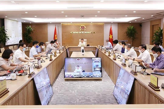 Bộ trưởng Nguyễn Mạnh Hùng chủ trì Hội nghị giao ban. Ảnh Mic