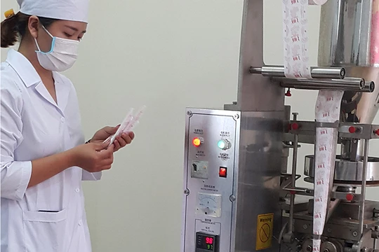 Dây chuyền đóng gói tự động của Viện Cơ điện nông nghiệp sau thu hoạch. Ảnh: PN