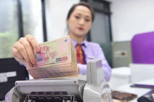 NHNN yêu cầu các ngân hàng giảm lãi suất cho vay 