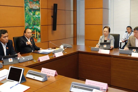 Thủ tướng Nguyễn Xuân Phúc phát biểu tại tổ đại biểu Quốc hội. - Ảnh: VGP.