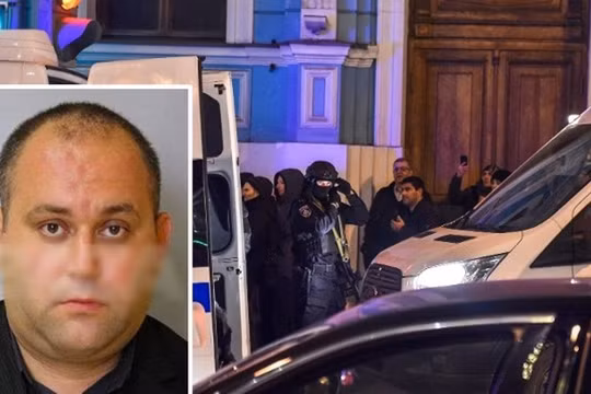 Kẻ khủng bố Yevgeny Manyurov và lực lượng an ninh có mặt tại hiện trường. Ảnh: Đông Phương.