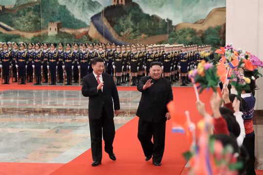 Chủ tịch Trung Quốc Tập Cận Bình và Chủ tịch Triều Tiên Kim Jong-un trong chuyến thăm Bắc Kinh hồi tháng 1 năm nay (Ảnh: AP)