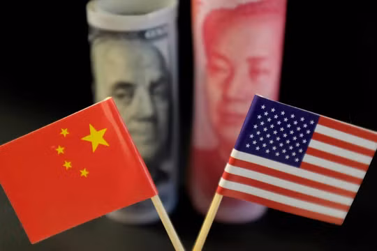 Thương chiến Mỹ-Trung có thể biến thành một cuộc chiến tiền tệ (Ảnh: Reuters)