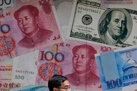 Chính quyền Trump coi Trung Quốc là nước "thao túng tiền tệ" sau khi để đồng NDT xuống giá so với đồng USD (Ảnh: Time)