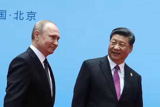 Tổng thống Putin và Chủ tịch Tập Cận Bình trong cuộc gặp tại Bắc Kinh hồi đầu năm nay (Ảnh: AFP)