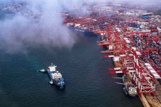 Xung đột thương mại Mỹ - Trung ảnh hưởng tiêu cực tới hoạt động kinh doanh của doanh nghiệp châu Âu (Nguồn: AFP)