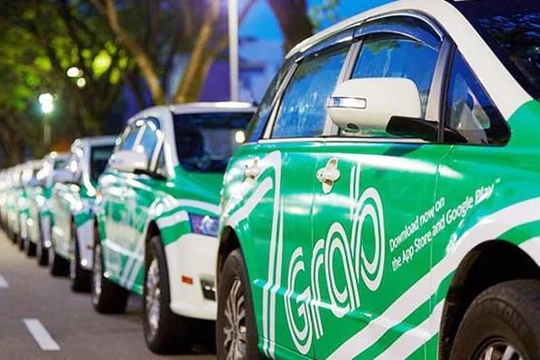 Taxi công nghệ GrabCar (ảnh Xuân Lan)