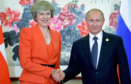 Thủ tướng Anh Theresa May và Tổng thống Nga Putin.