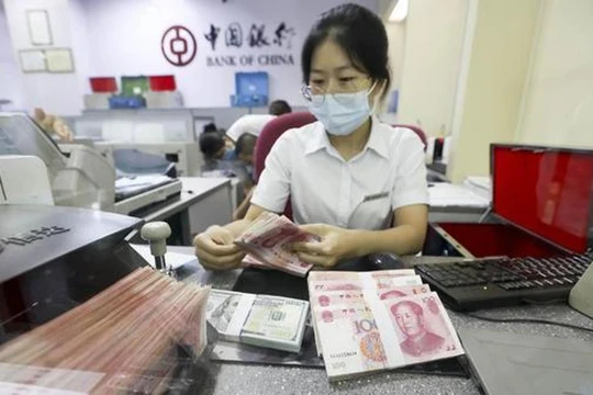 Từ ngày 25/10, nhiều ngân hàng Trung Quốc sẽ cùng nhau điều chỉnh giảm lãi suất vay thế chấp mua nhà thêm 0,3% (Ảnh: Yicai)