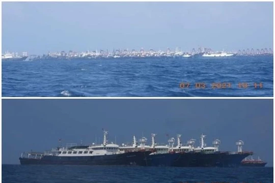 Tàu cá chở dân binh Trung Quốc neo đậu dày đặc ở gần bãi Ba Đầu (Ảnh: Đông Phương).