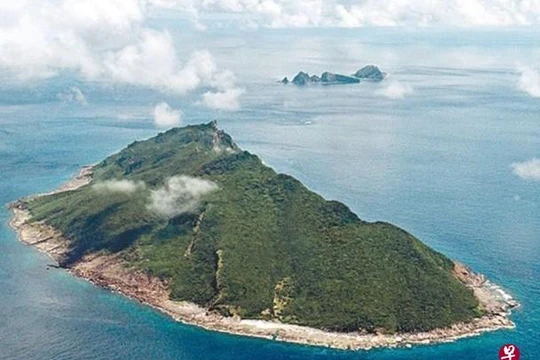 Kyodo News cho rằng hai bên Nhật, TRung cùng ám chỉ sử dụng vũ lực ẩn chứa nguy cơ leo thang thành tình huống nguy hiểm khó lường ở Senkaku (Ảnh: zaobao).
