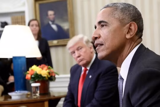 Tổng thống Mỹ Barack Obama và ông Donald Trump.