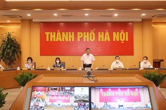 Chủ tịch UBND Thành phố Chu Ngọc Anh phát biểu tham luận tại Hội nghị. Ảnh: Cổng TTĐT Hà Nội.