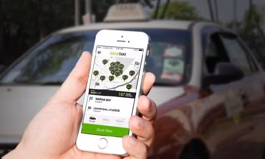 Theo UBND TP. Hà Nội hình thức dịch vụ đi xe chung của Cty Grab taxi chưa có các biện pháp đảm bảo an toàn cho hành khách đi xe, không phù hợp với một số quy định pháp luật. (Ảnh minh họa, nguồn internet).