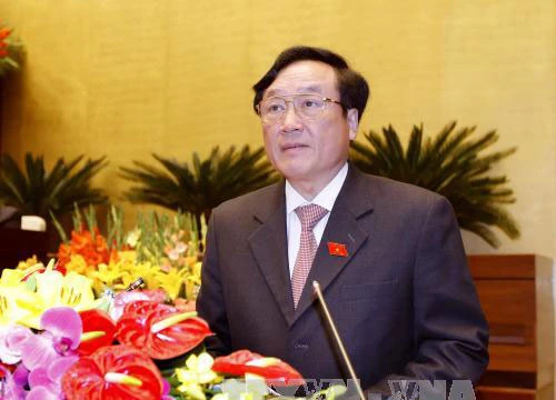 Viện trưởng VKSND Tối cao Nguyễn Hòa Bình trình bày báo cáo nhiệm kỳ 2011-2016 tại Quốc hội chiều 22-3 Ảnh: TTXVN