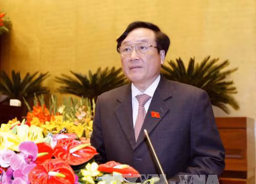 Viện trưởng VKSND Tối cao Nguyễn Hòa Bình trình bày báo cáo nhiệm kỳ 2011-2016 tại Quốc hội chiều 22-3 Ảnh: TTXVN