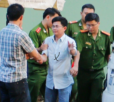 Ông Lợi bị bắt. Ảnh: Kh.Uyên