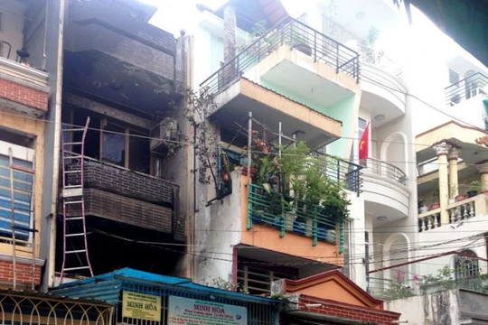 Ngôi nhà 2 tầng nơi xảy ra vụ cháy - Ảnh : Đại Việt