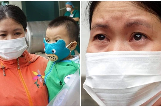 Người mẹ vui mừng bật khóc khi con gái hơn 1 tuổi được chữa khỏi COVID-19 (Ảnh: Nguyễn Trăm ghép) 
