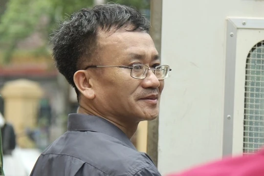 Bị cáo Nguyễn Quang Vinh bị cáo buộc chủ mưu vụ nâng điểm, VKS đề nghị mức án 7 đến 8 năm tù. Ảnh: Zing