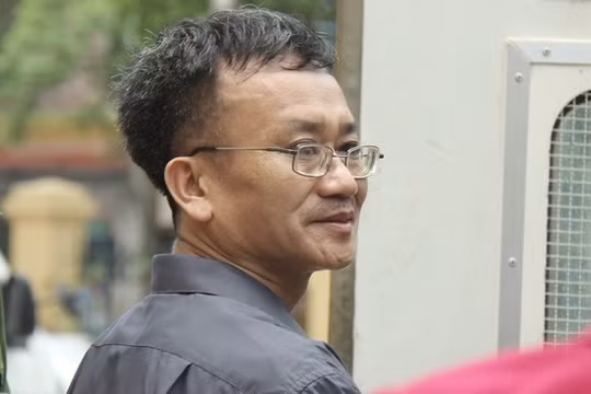 Bị cáo Nguyễn Quang Vinh bị cáo buộc chủ mưu vụ nâng điểm, VKS đề nghị mức án 7 đến 8 năm tù. Ảnh: Zing